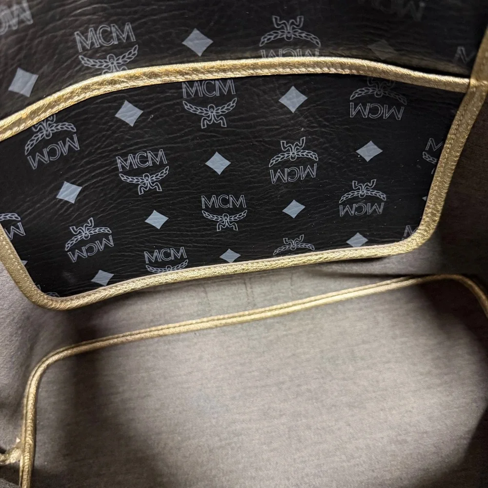 MCM Visetos Monogram Medium Tote Bag Black Gold‎ Lion Graphic Striped